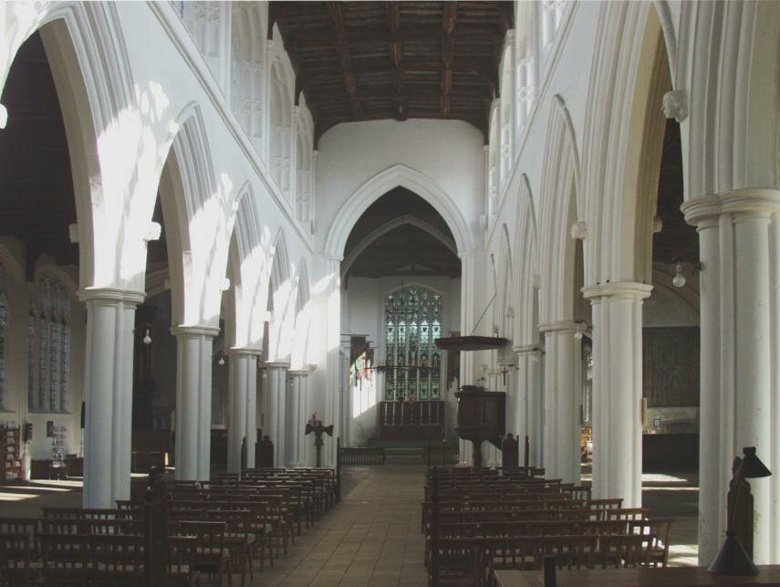 The Nave, showing the pulpit and canopy, of the parish church, Thaxted, Essex, England