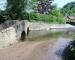 View of Gallox Medieval Packhorse Bridge over the River Avill, Dunster, Somerset