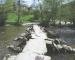 View of Tarr Steps Clapper Bridge crossing the River Barle, Exmoor, Somerset