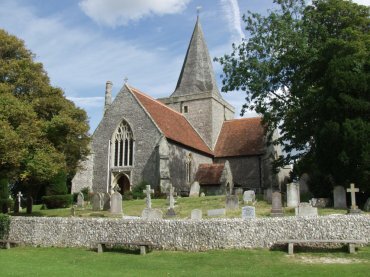 Scene showing Saint Andrew's Church, Alfriston, Sussex, England