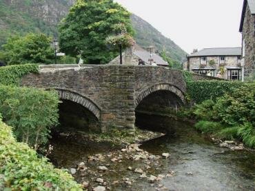 Scene showing the bridge over the River Colwyn, Beddgelert, Snowdonia, Caernarvonshire (Gwynedd), Wales