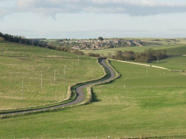 The road from East Dean to Birling Gap seen from the cliff top, South Downs, Sussex, England
