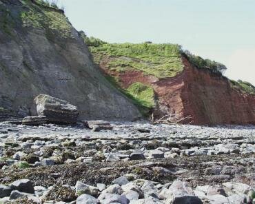 View of an obvious fault in the cliffs at Blue Anchor, Somerset, England