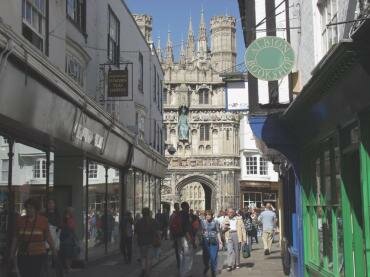Scene showing Christchurch Gate, Canterbury Cathedral, from the narrow medieval Mercery Lane, Canterbury, Kent, EnglandCanterbury