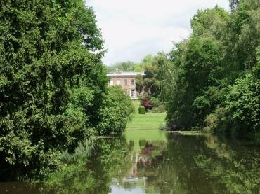 View of the Queen Anne House from across one of the lakes, Hedingham Castle, Essex