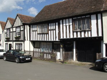 Photograph of some ancient half-timbered buildings, Castle Hedingham, Essex