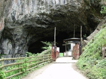 View of the entrance to Peak Cavern, Castleton, Derbyshire Peak District