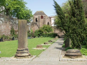 View of some Roman Column bases displayed in the Roman Gardens, Chester, Cheshire, England