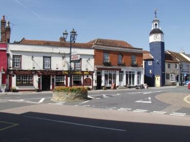 View of Coggeshall town centre showing the clock tower, Coggeshall, Essex, England