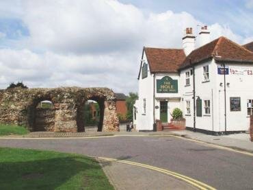 Photograph of the Hole in the Wall pub and the Balkerne Gate, Colchester, Essex, England