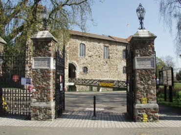 Scene showing an entrance gate to Castle Park, Colchester, Essex, England