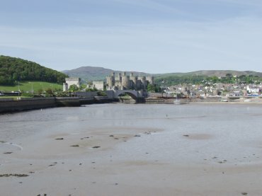 Photo looking across the river at Conway Castle and the town, Conway, Snowdonia, Caernarvonshire (Gwynedd), North Wales
