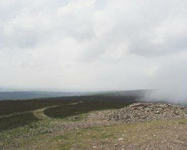 Scene from the top of Dunkery Beacon with clouds brushing the ground, Exmoor, Somerset, England