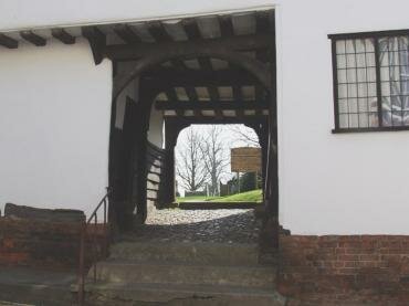 Photograph of the entrance to the Guildhall and the churchyard, Finchingfield, Essex, England