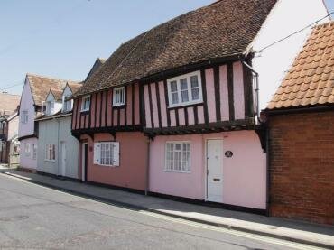 Photograph of Half-timbered, colour washed, houses in the High Street, Hadleigh, Suffolk, England