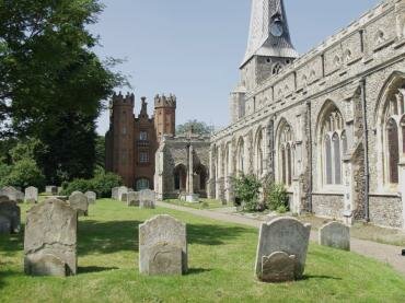 Scene showing the 15th Century St. Mary's Church and the Deanery Tower, Hadleigh, Suffolk, England