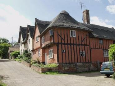 View of thatched, half-timbered, colour washed houses, Kersey, Suffolk, England