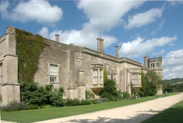 View of the south side including Sharington's Tower, Lacock, Wiltshire (Wilts), England