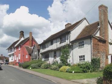 Photo of some of the historic half-timbered buildings in Lady Street, Lavenham, Suffolk, England