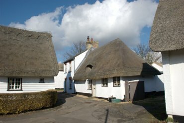 View of a thatched corner, Lode, Cambridgeshire, England