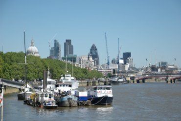 Photograph of  the River Thames alongside the Victoria Embankment looking east, London, England