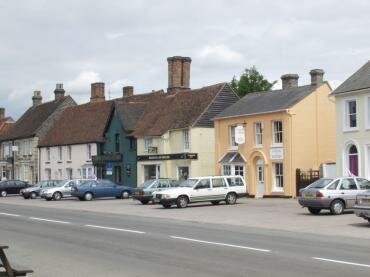 View of colour washed buildings in Hall Street, Long Melford, Suffolk, England