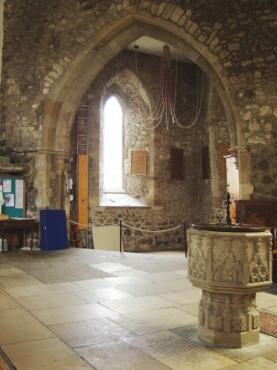 Picture of the Font and entrance to the triangular tower, All Saints Church, Maldon, Essex, England