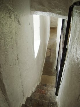 View of the narrow passage in the church tower, Rye, Sussex, England, Great Britain