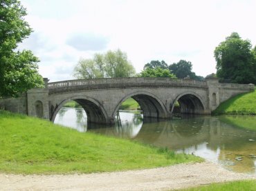 View of the Lion Bridge, Burghley House, Stamford, Lincolnshire, England
