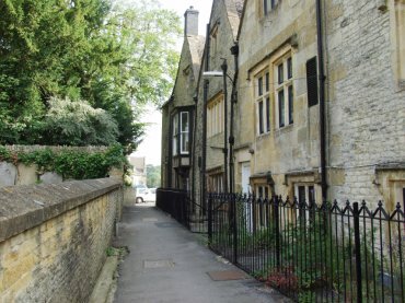 View of a little alley by the churchyard, Stow-on-the-Wold, Gloucestershire, England