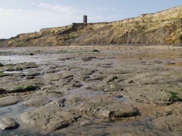 London Clay at low tide and the Red Crag cliffs, Walton-on-the-Naze, Essex, England