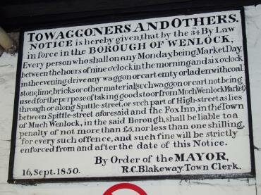 An old notice board displayed in the 16th Century Guildhall, Much Wenlock, Shropshire, England