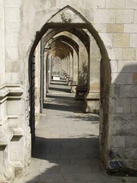 Scene through the flying buttresses, Winchester Cathedral, Winchester, Hampshire (Hants), England