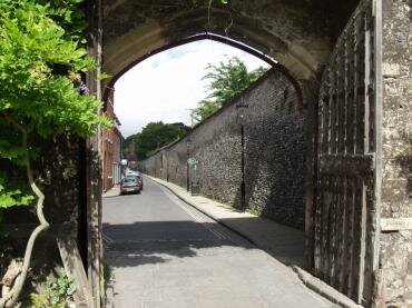 View through Priors Gate along St. Swithun Street, Winchester, Hampshire (Hants), England
