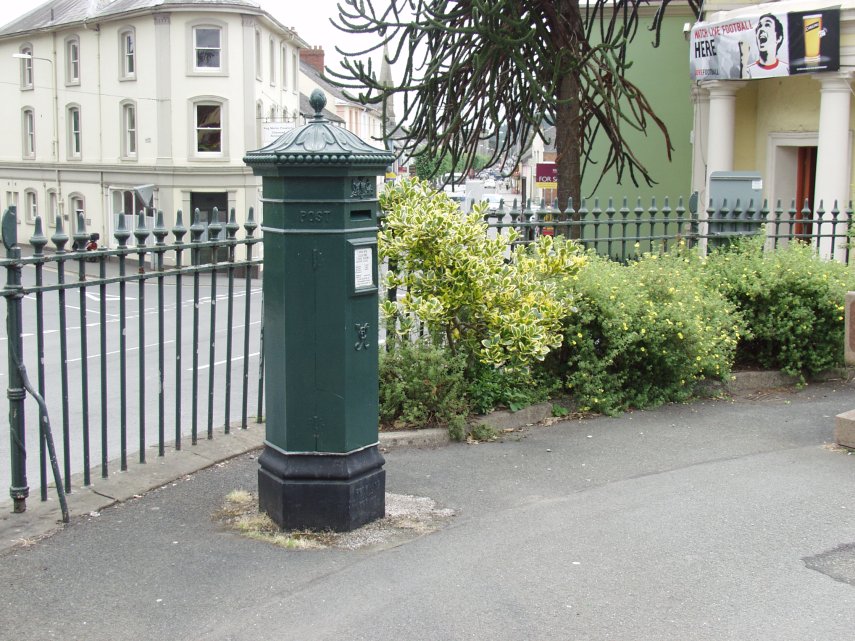 The green Victorian hexagonal post box, Brecon, Brecknockshire, Wales, Great Britain.
