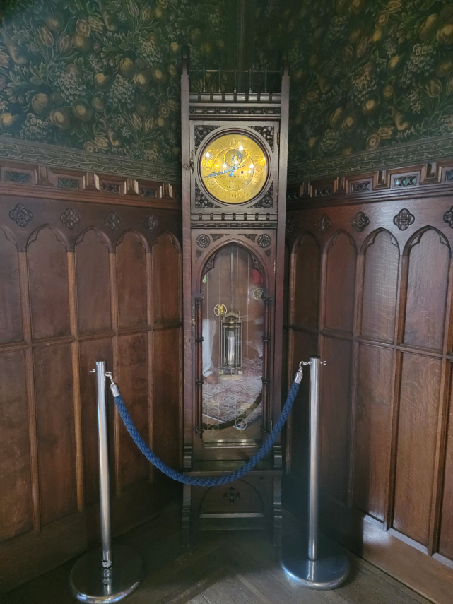 A Long Case Clock in the Small Dining Room Room, Cardiff Castle, Cardiff, Glamorgan, Wales, Great Britain.