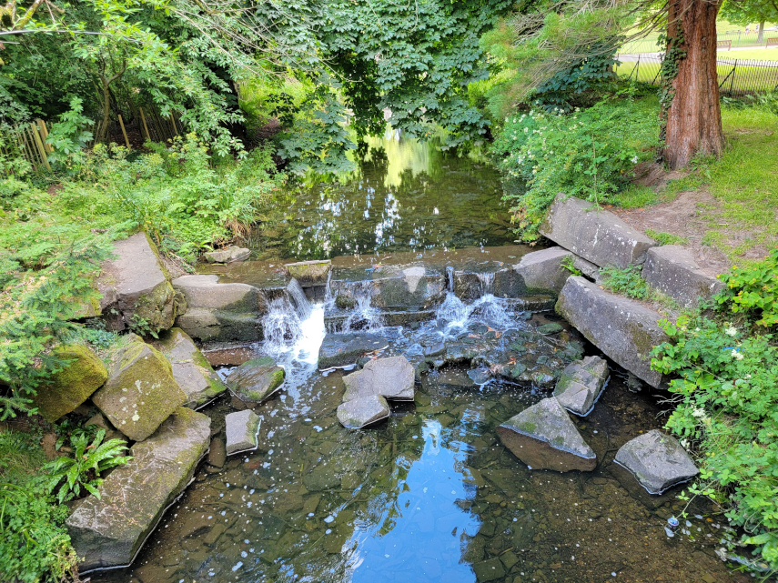 The Nant Fawr stream runs through Roath Park, Cardiff, Glamorgan, Wales, Great Britain.