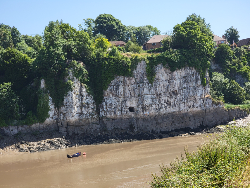 Gloucester Hole in limestone cliffs, River Wye, Chepstow, Monmouthshire, Wales