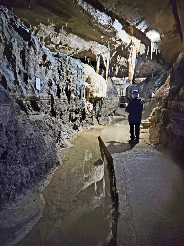 The 'Beehive' and the 'Sword of Damocles' calcite decorations in the main stream passage, Ingleborough Cave, Clapham, Yorkshire, England, Great Britain