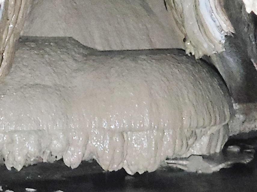 A calcite formation in the main stream passage, Ingleborough Cave, Clapham, Yorkshire, England, Great Britain