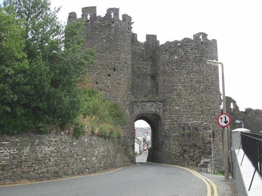 A road passing through a very narrow archway, Conway, Gwynedd, Great Britain