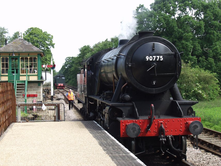 Locomotive approaching its train, Holt Station, Norfolk, England, Great Britain