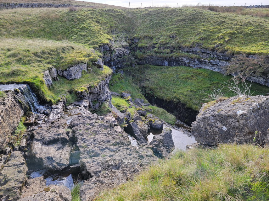 Hunt Pot with stream, Peny-y-Ghent, Yorkshire, England, Great Britain