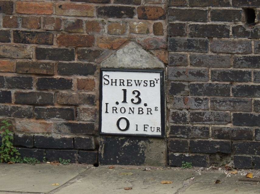 An old milepost, Ironbridge, Shropshire, England