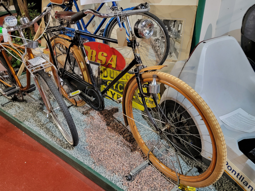 A bicycle with wooden wheels and mudguards, Cycle Museum, Llandrindod Wells, Radnorshire