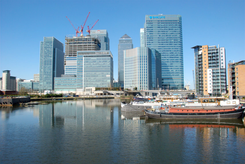 Canary Wharf seen across Blackwall Basin, Docklands, London, England, Great Britain