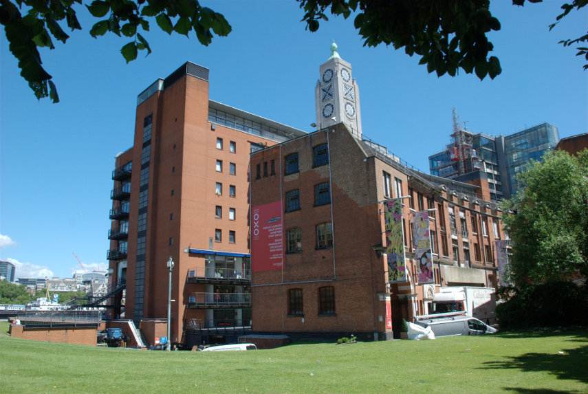 The Oxo Tower from the Bernie Spain Gardens, Southwark, London, England, Great Britain