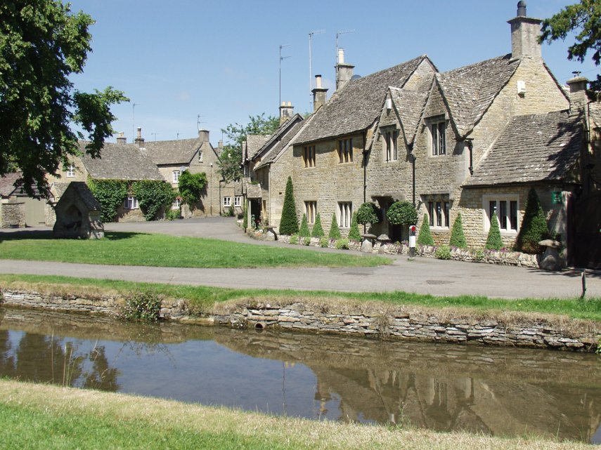 Scene showing Cotswolds Cottages, Lower Slaughter, Gloucestershire, England