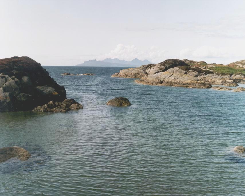 Photograph of the Isles of Rum and Eigg from the coast of the Ardnamurchan Peninsula, Highlands, Scotland