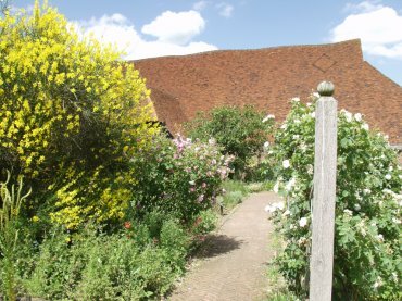 View of the Tudor Garden and Wheat Barn, Cressing Temple Barns near Braintree, Essex, England